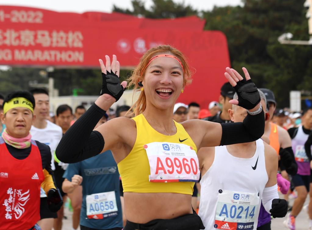 奔跑，繪就城市靚麗的風(fēng)景——從北京馬拉松看全民健身熱潮